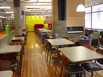 Cafeteria-style room with rows of tables